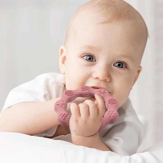 anneau de dentition anneau réconfort rose bébé ventre 