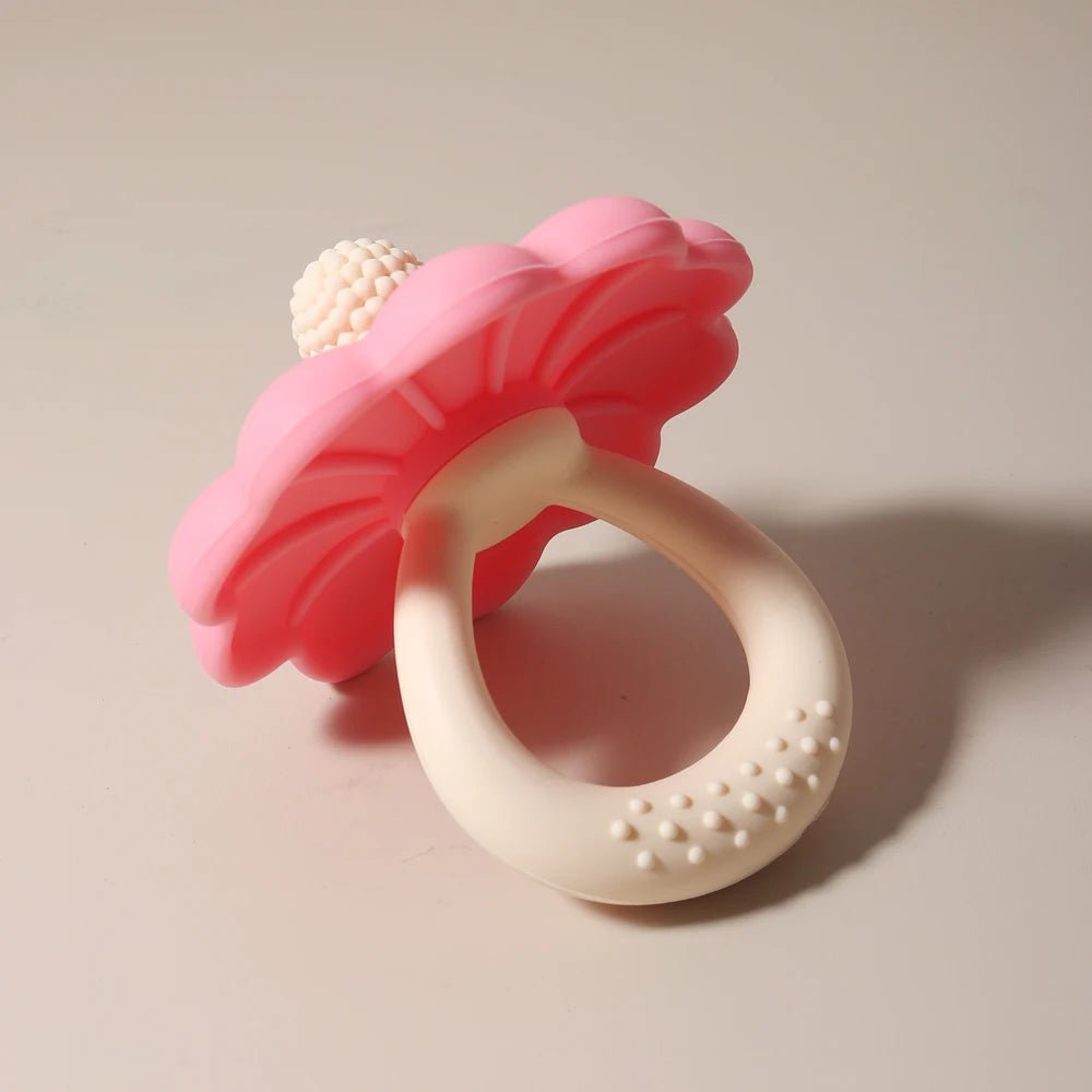 anneau de dentition bébé fleur rose dessous