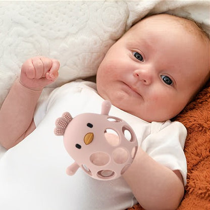 Anneau de dentition bébé poussin bébé tient main